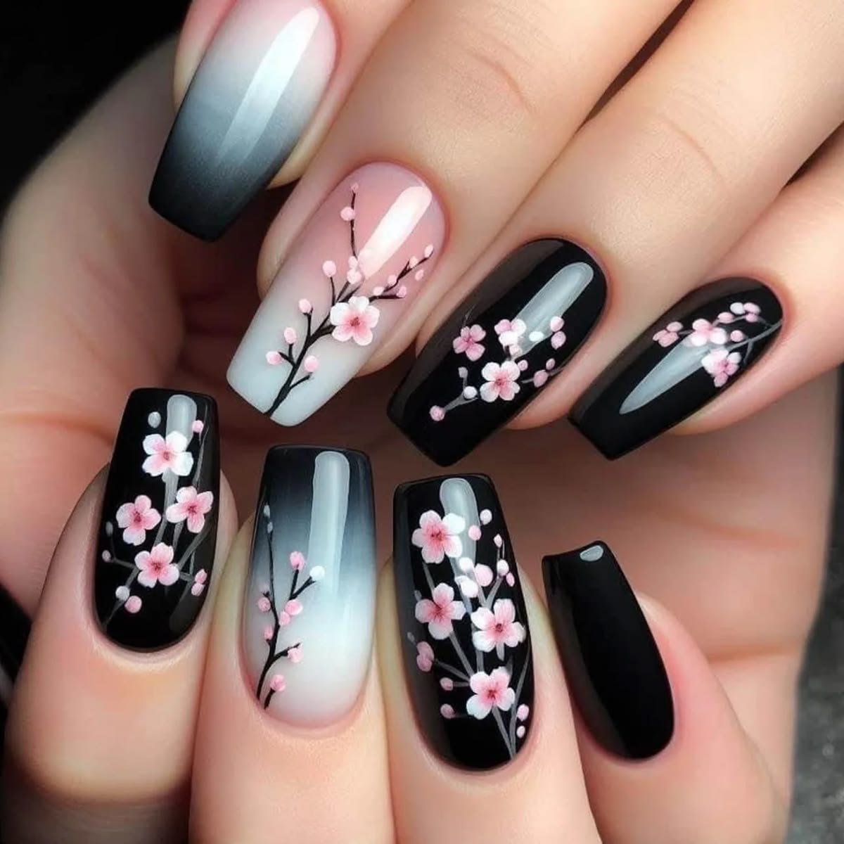 black-pink-floral-nail-design