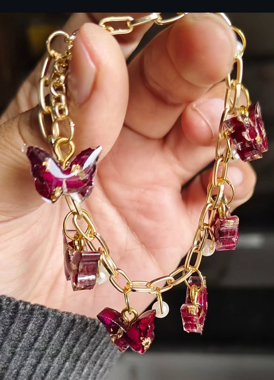 gold-chain-bracelet-burgundy-resin-charms