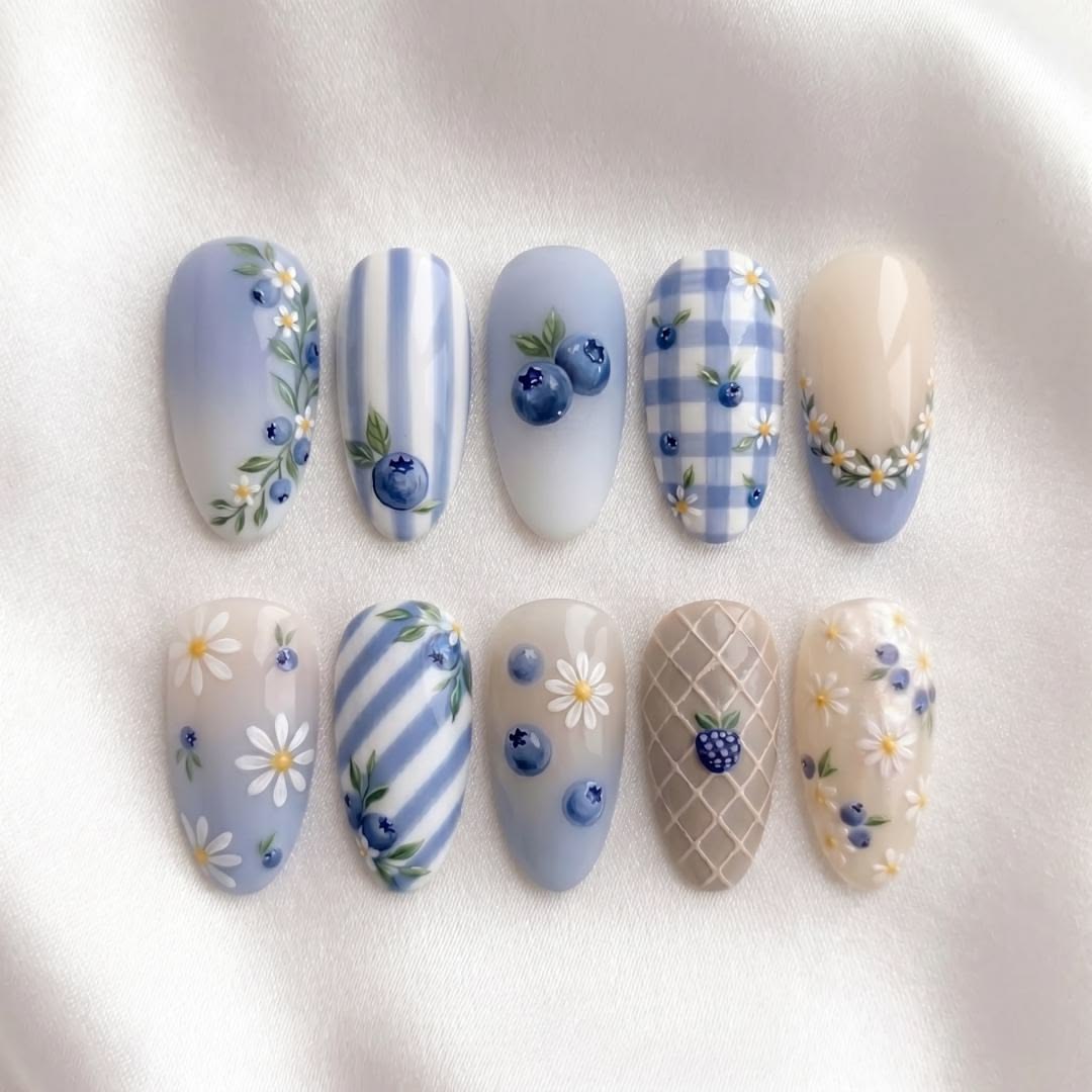 pastel-blue-floral-blueberry-nail-design