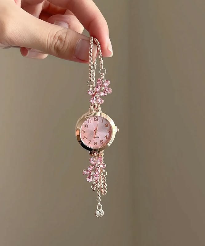 ساعت دستبندی زنانه صورتی با آویز گل ظریف