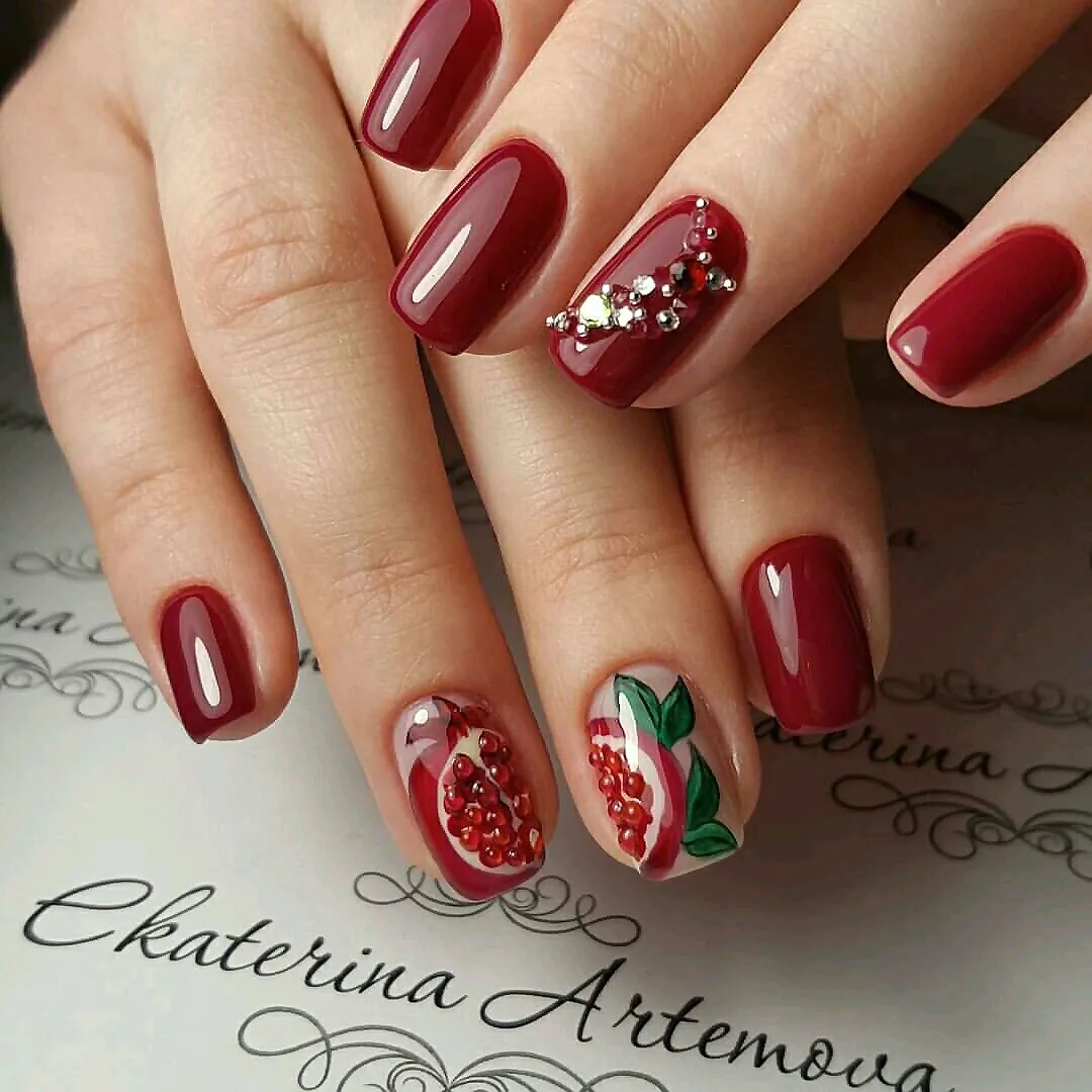 burgundy-pomegranate-rhinestone-nail-art-design