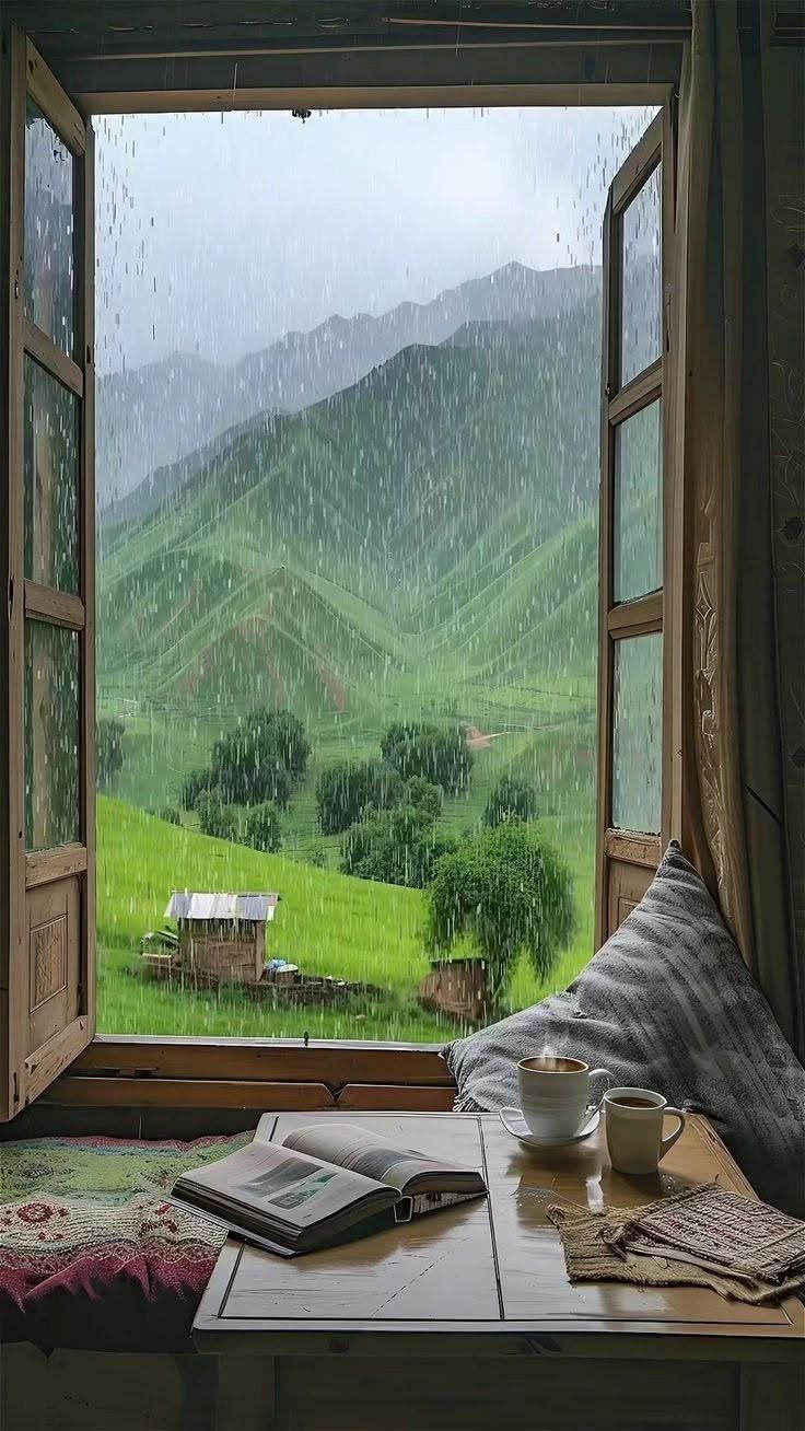 باران کوهستان از قاب پنجره چوبی