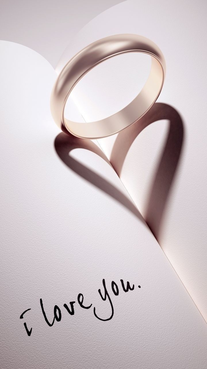 عکس حلقه ازدواج با سایه قلبی و نوشته i love you